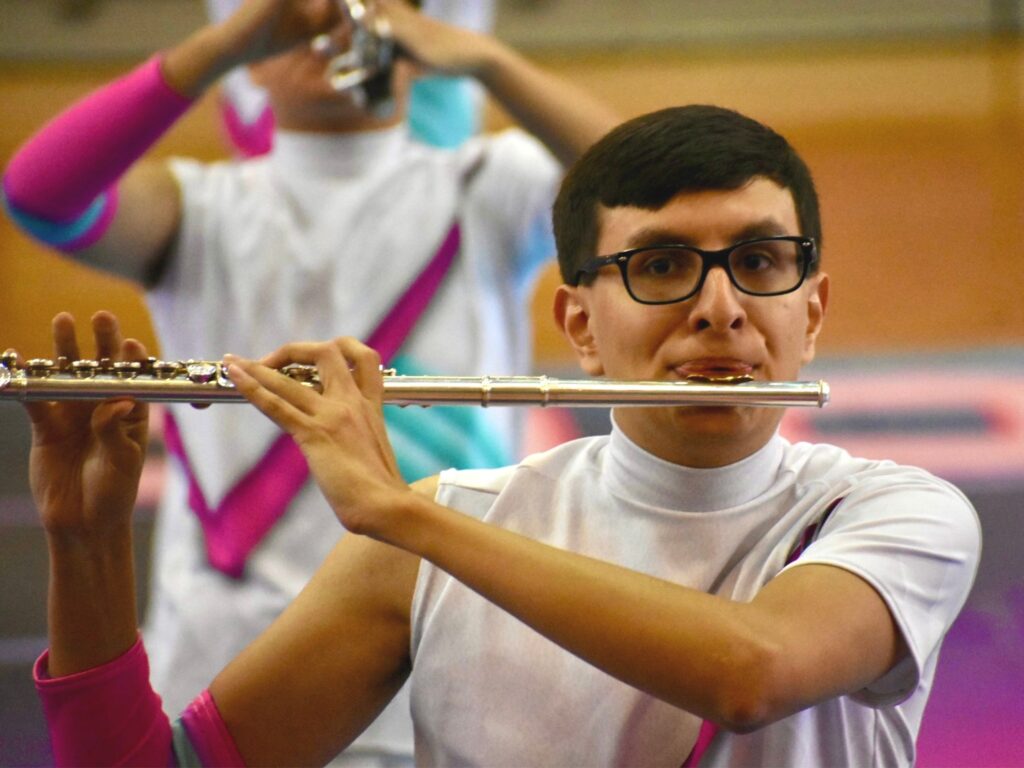 Flute player performing Harmonic Horizons, 2024
